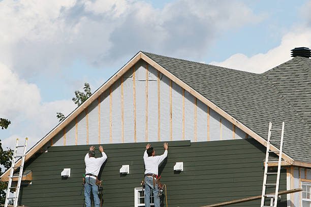 Professional Siding technician working in Burkittsville, MD